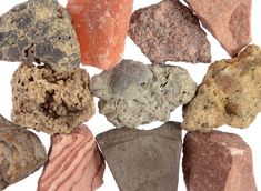 several different colored rocks arranged in a circle