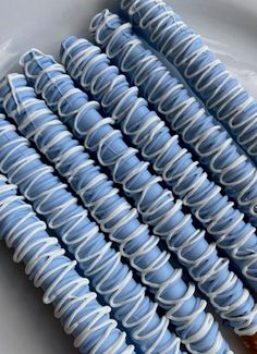 several blue and white spirals on a plate