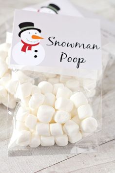 small marshmallows are wrapped in cellophane to look like a snowman