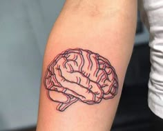 a small tattoo of a brain on the arm