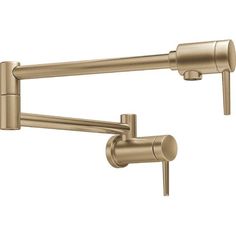 an image of a kitchen faucet with two handles and one arm in brushed brass