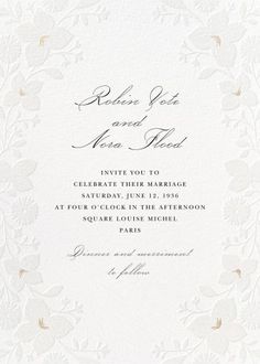 a wedding card with white flowers and gold foil on the front, in black ink