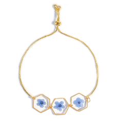 PRICES MAY VARY. Forget-Me-Not Bracelet Delicate bracelet with pressed blue "forget-me-not" flowers. Delicate bracelet with 1.6cm/0.6in hexagonal charm and coloured diamond embellishments, flower bracelet material is brass, bracelet length 24cm/9.5in. Forget-me-nots, the flower of loyalty, symbolises eternal love, compassion and a touch of nostalgia and is the perfect flower to give to a close friend, family member or someone special on any occasion. Makes a great gift for special occasions such Hexagon Bracelet, Customised Bracelets, Brass Bracelet, Flower Bracelet, Bracelet Gift, Pretty Jewellery, Pressed Flowers, Delicate Bracelet, Womens Bracelets