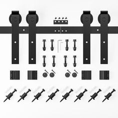 an assortment of black hardware and accessories on a white background