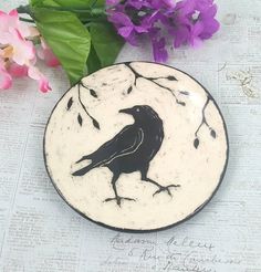 Check out this item in my Etsy shop https://www.etsy.com/listing/827960478/raven-or-crow-bird-sgraffito-ceramic Bird Pottery, Clay Turtle, Sgraffito Technique, Ceramic Wall Sculpture, Candy Snacks, Cone Incense, Food Plate, Crow Bird, Bird Plates