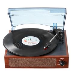 an old - fashioned record player with its turntable open and ready to play music