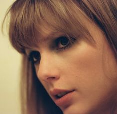 a close up of a person with long hair