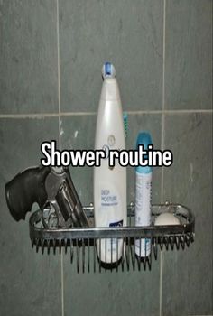 there is a hair dryer and other items on the shelf in the shower rack