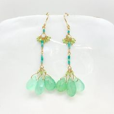 Wire: 14k Yellow GoldEarring Length: Approx. 1 1/2”Stones: Chrysoprase Drops (approx. 6mm/7mm size), Turquoise (approx. 3mm sizes)Beads: Antique Italian Glass (Approx. 1/2mm size)Listed is a handmade 14k Yellow Gold Wire Earring with Chrysoprase Drops, Turquoise Nuggets and Antique Italian Glass Beads. —————————————————————————Let me know if you have any questions! *Made to order (allow 5-7 days)*Allow 7-10 days for shipping (FedEx)_______________________________________________________About Deb Wire Earring, Yellow Gold Earrings, Gold Bracelet Chain, Gold Earring, Yellow Gold Earring, Gold Wire, Wire Earrings, Gold Chain Necklace, Jewelry Business