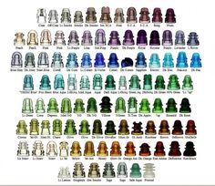 a large collection of glass chess pieces in different colors and sizes, all with the same pattern