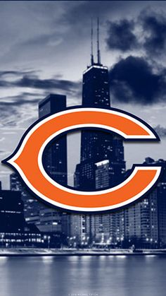 the chicago bears logo in front of a city skyline