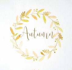 the word autumn written in watercolor surrounded by leaves and branches royalty - free stock photo