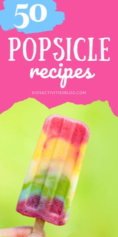 a hand holding a popsicle with the words 50 popsicle recipes on it in front of