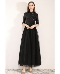 Black Stretch Evening Dress For Party Season, Winter Party Maxi Length Evening Dress, Black Full Length Dress For Winter, Winter Party Floor-length Evening Dress, Black Full Length Winter Dress, Black Full-length Winter Dress, Black Sequin Dress For Banquet, Black Floor-length Dress With Sequins, Winter Floor-length Stretch Dresses