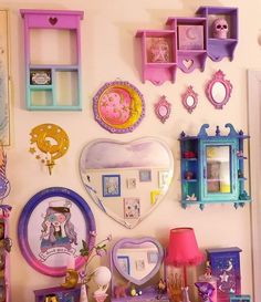 the wall is filled with many different items and decorations, such as mirrors, shelves, and other decorative objects