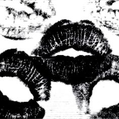 black and white image of three circular objects in the shape of an animal's mouth