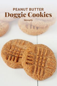 two peanut butter dog biscuits sitting on top of a white table with text overlay that reads, peanut butter doggie cookies skinnymys