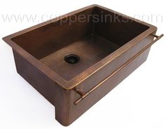 an old fashioned copper sink on a white background