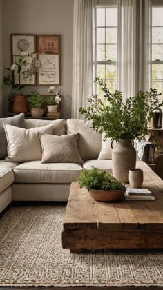 a living room filled with furniture and lots of plants on top of a coffee table