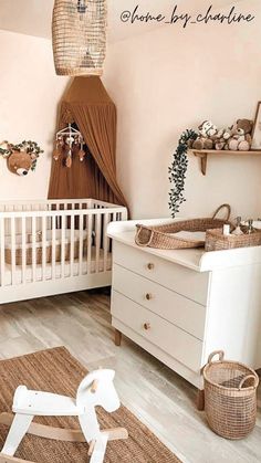 a baby's room is decorated in neutral colors