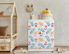 a child's room with a bed, dresser and toy animals on the floor