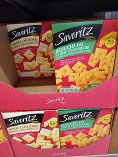 three boxes of savortz crackers sitting on a shelf