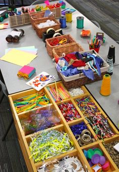 an assortment of craft supplies on a table