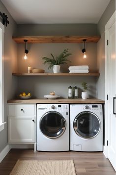 Cozy laundry room with warm gray walls and reclaimed wood shelving Tiny Laundry Room Ideas, Laundry Room Storage Solutions, Wet Kitchen, Modern Farmhouse Laundry Room, Tiny Laundry, Small Utility Room, Laundry Room Colors, Laundry Room Ideas Small Space, Tiny Laundry Rooms