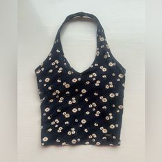 Hollister Halter Top, Size Xxs, Navy Blue With Daisys, Never Worn, Perfect Condition, Built In Bra Trendy Fitted Triangle Top, Trendy Fitted Triangle Tank Top, Fitted Triangle Top With Floral Print, Fitted Floral Print Triangle Top, Casual Fitted Tops For Beach, Printed Fitted Summer Tank Top, Casual Stretch Triangle Tank Top, Spring Fitted Triangle Top, Fitted Triangle Top For Spring