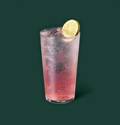 a tall glass filled with pink liquid and a lemon slice on the rim, against a dark green background