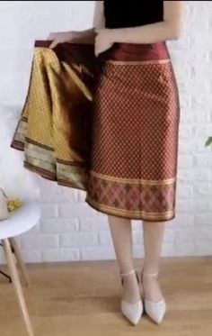 Dimensions Waist : 24-33 Inches. Hip : 36-40 Inches. Length: 27-29 Inches; Material: Silk Thai Wrap around with hook.(ตะขอ) ผู้ซื้อต้องเย็บตะขอติดเอง Use for : Thai skirt product of Thailand. Luxury Silk Bollywood Skirt, Cheap Traditional Fitted Skirt, Silk Skirt Free Pattern, Chinese Wraps, Lao Sinh, Thai Skirt, Lao Dress, Thai Outfits, Kurta Fashion