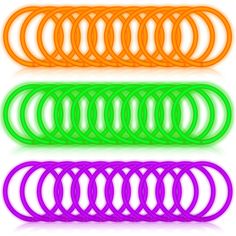 four different colors of neon rings on a white background