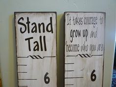 two wooden signs that say stand tall and 6