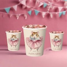 three paper cups with hamsters on them