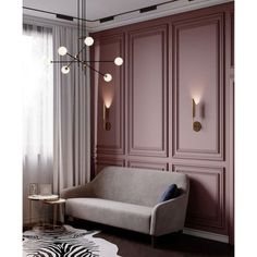 a living room with pink walls and furniture