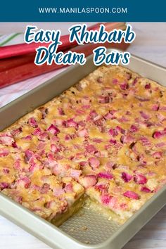 easy rhubarb dream bars in a baking pan with the words, easy rhubarb dream bars