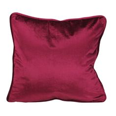 a red pillow on a white background with no one in the photo to describe it