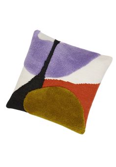 a pillow with an abstract design on it