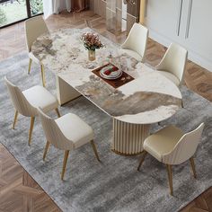 a marble dining table surrounded by white chairs