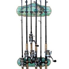 four fishing rods are attached to the back of a fish rod holder with two reels