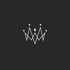 a black and white crown logo on a dark background