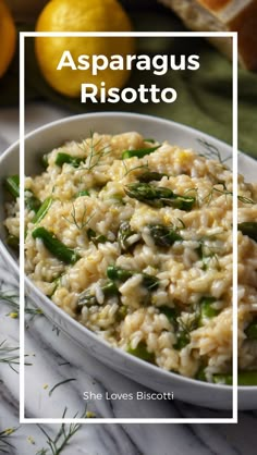 asparagus risotto in a white bowl with lemons and dill on the side