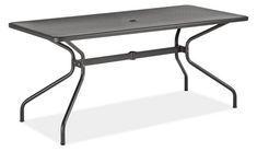 an outdoor table with metal legs and a rectangular top, on a white background stock photo