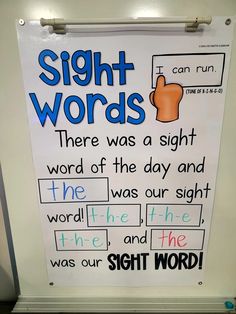 a sign with words written on it in front of a door that says sight words there was a sight word of the day and the word was our sight