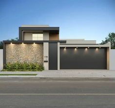 a modern house with two garages on the street