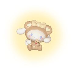 a brown and white teddy bear sitting on top of a stuffed animal with it's head turned to the side