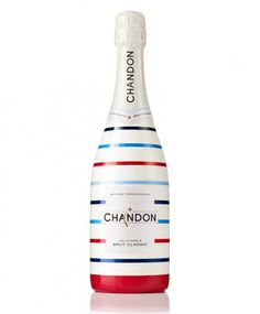 a bottle of chandon white wine with red, white and blue stripes on it