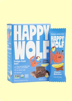 two bags of happy wolf chocolates on a yellow background with an orange and blue box