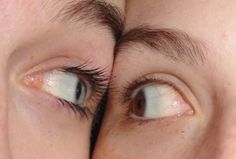 two people with very large eyes looking at the camera