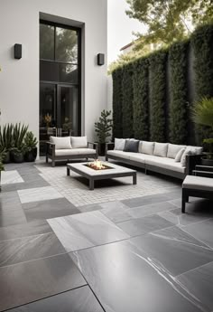 23 Gorgeous Paver Patio Ideas You Must See Patios Made With Pavers, Grey And White Patio Ideas, Paved Yard Ideas, Paving Backyard Ideas, Townhome Patio Ideas Townhouse, Outside Patio Flooring Ideas, Modern Patio Pavers, Patio Design Pavers, Modern Stone Patio